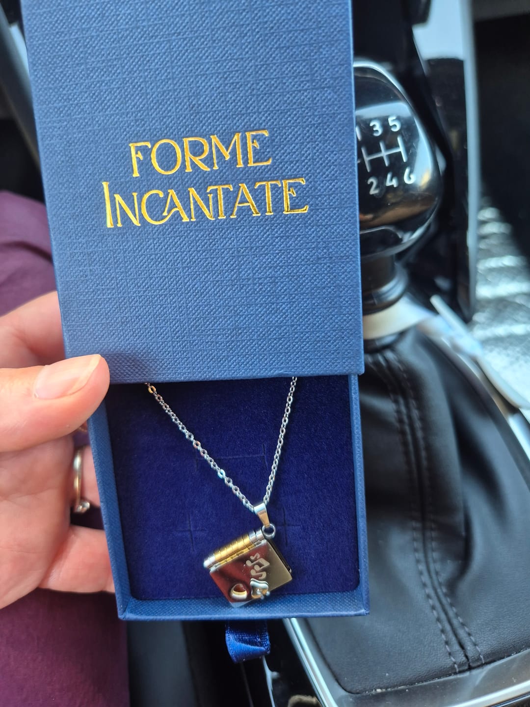 Customer photo review of Portachiavi/Collana Book ~ Frase Canzone Più Bella Cosa Non C'è...