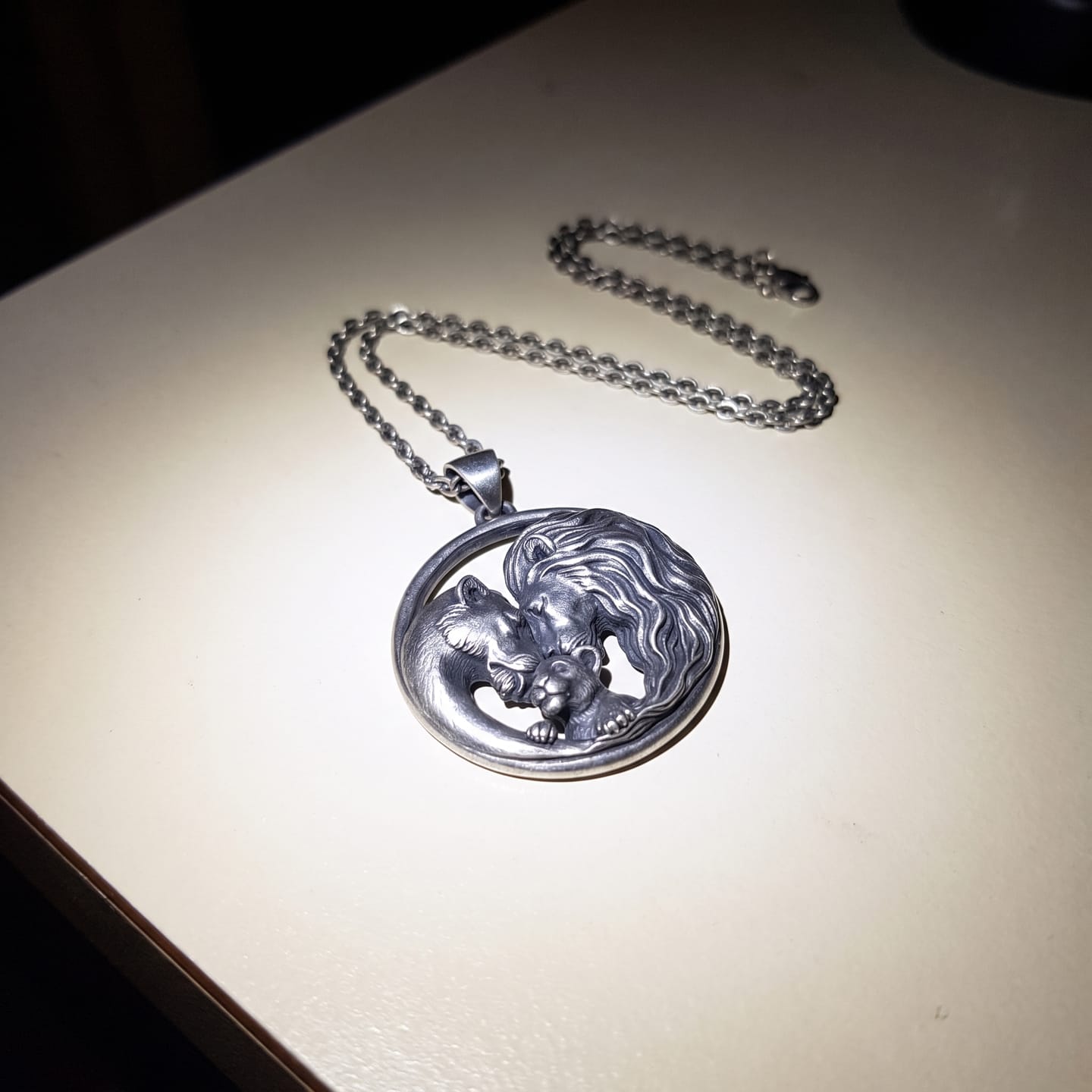 Customer photo review of Lioness and Cub Medallion Pendant