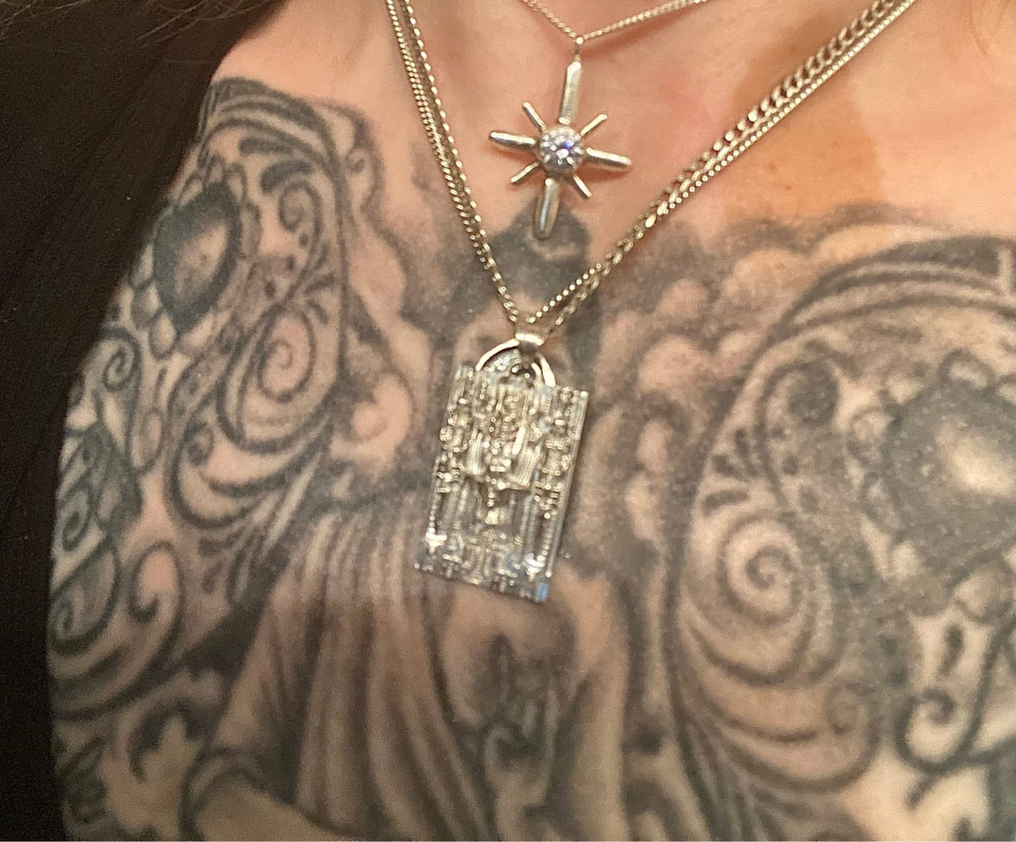 Customer photo review of Surrealist Sci-Fi Pendant