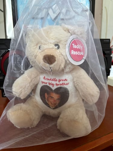 Customer photo review of A Cuddle from Heaven Personalised Photo Teddy Bear