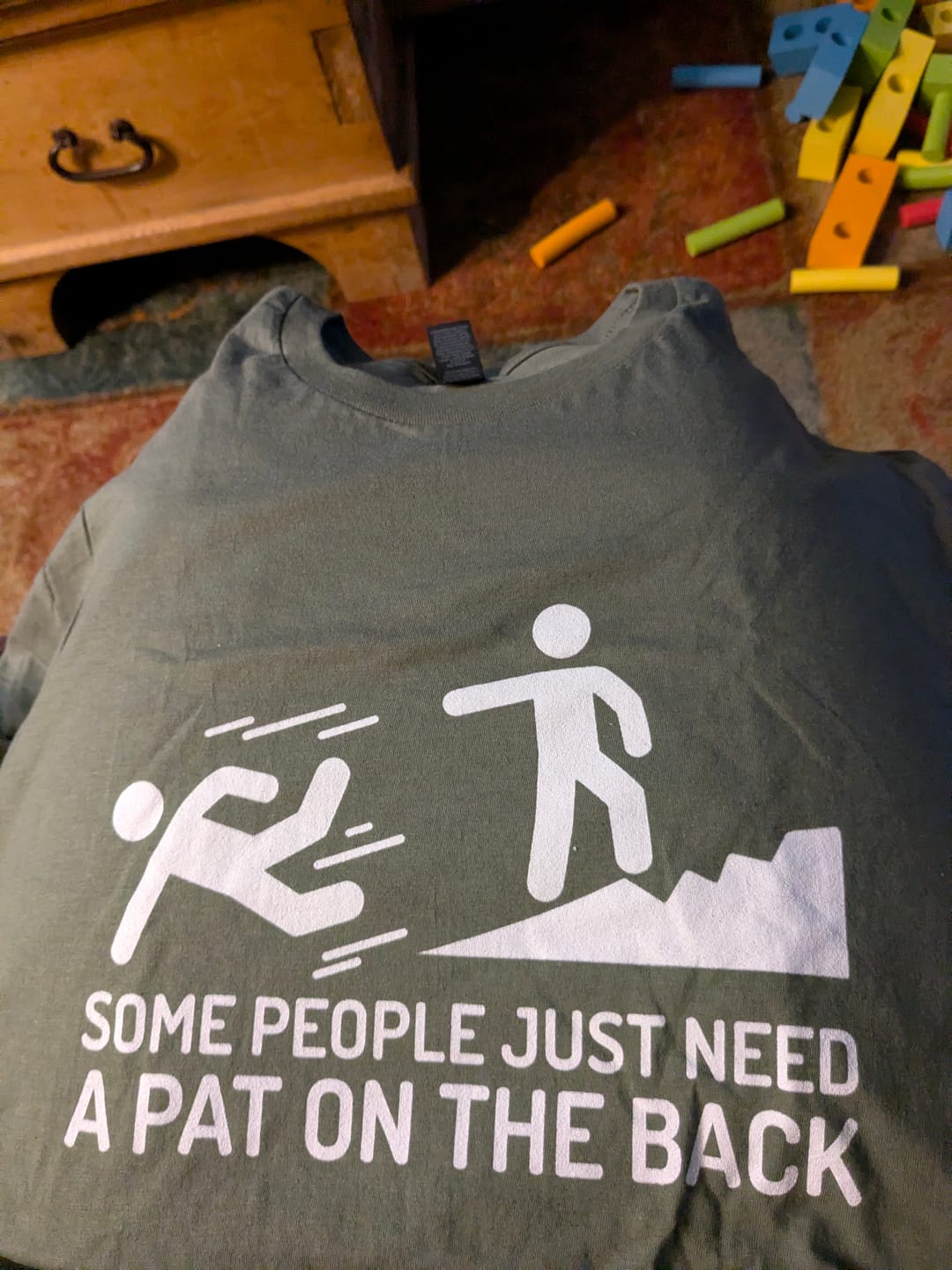 Customer photo review of Some People Need A Pat On The Back T-Shirt