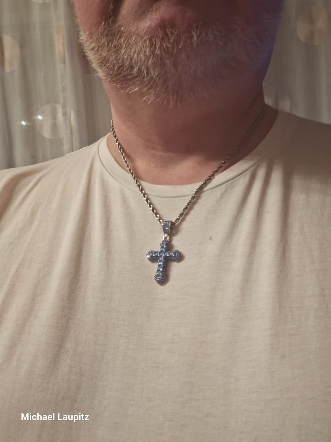 Customer photo review of BLUE CROSS PENDANT.