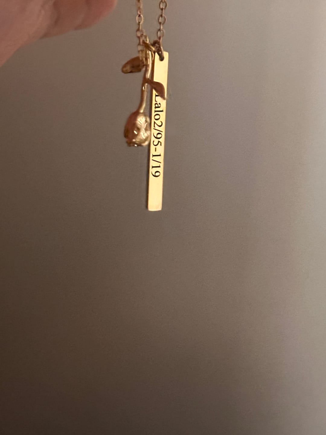 Customer photo review of Engraved Rose Bar Necklace