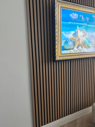 Customer's image of installed acoustic wall panels, secured by the drywall screws.