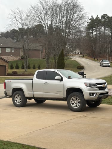 Customer's silver Chevy Colorado with a level stance after installing the 3-inch front lift kit.
