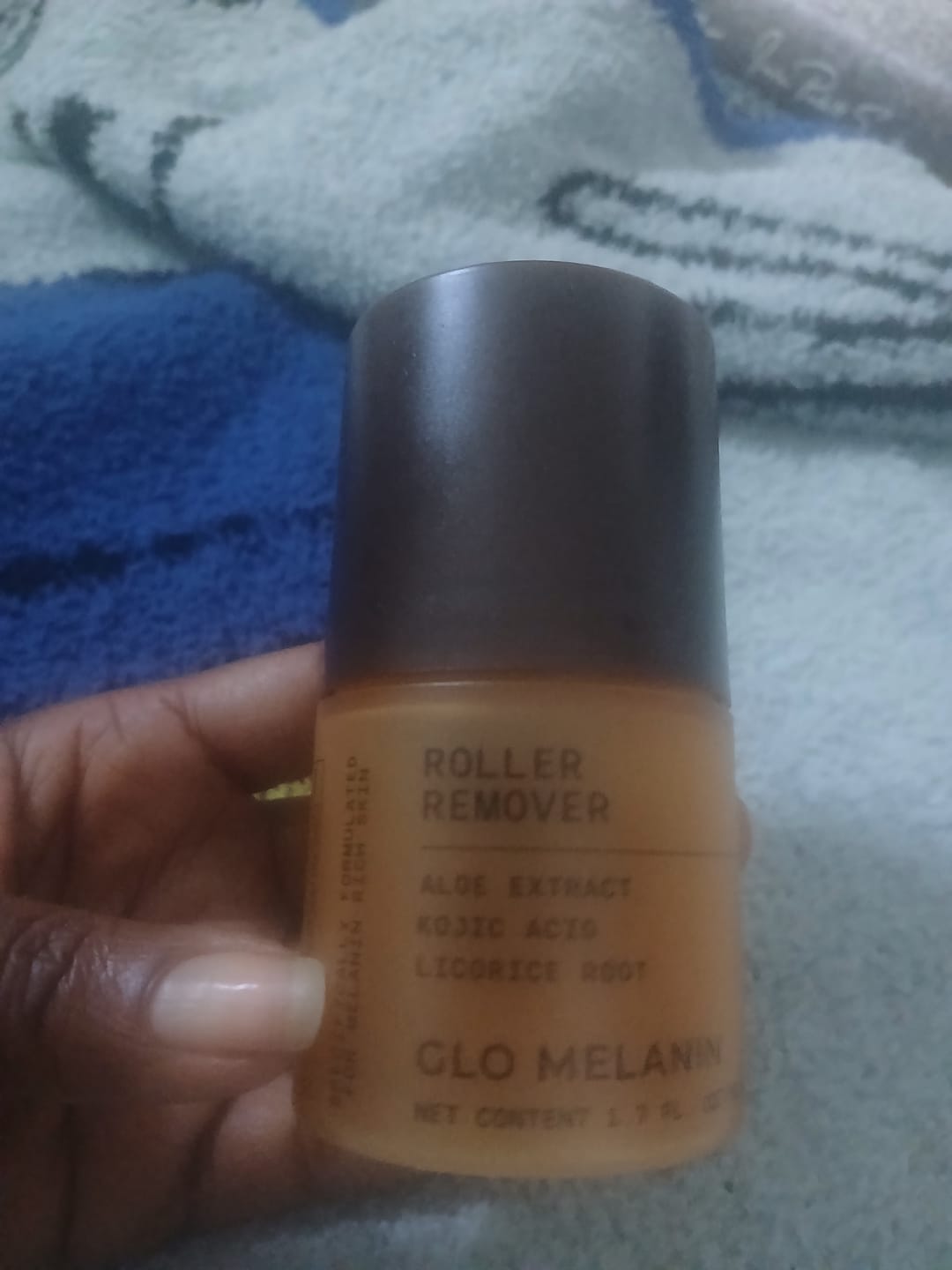 Customer photo review of Roller Remover (ingrowns and dark spots).