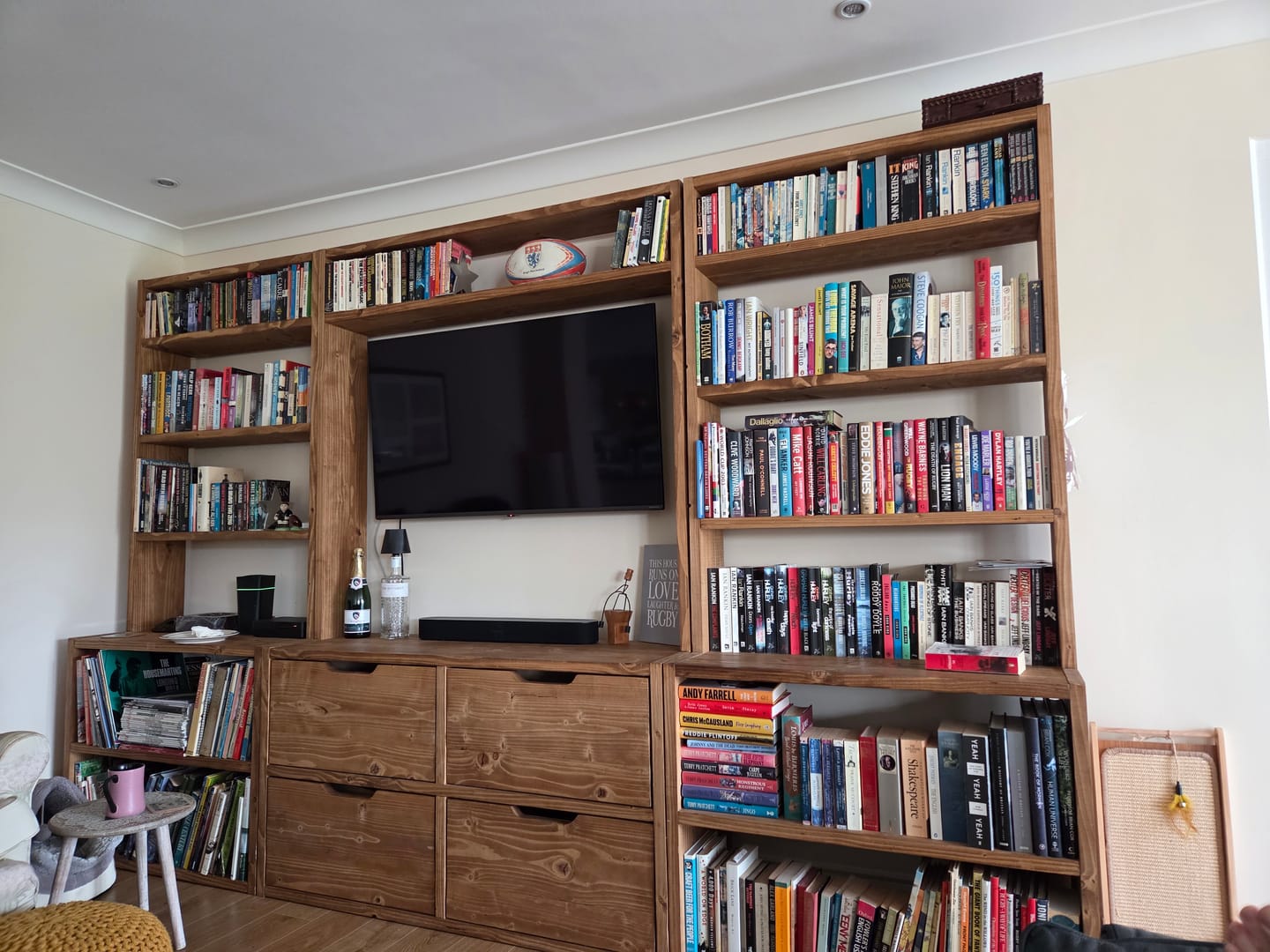 Customer photo review of Reclaimed Wood Bookcase & Shelving Units with TV Surround - Rustic Entertainment Center, Customizable Storage Solution