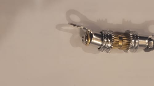 Customer's close-up of a partially assembled joint for the Cyberpunk Plasma Ball Spider, showing misaligned metal parts.