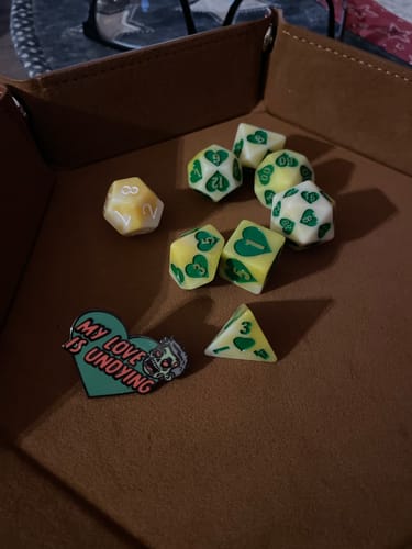 Customer photo review of Sweetheart Mystery Dice – Hearts & Flowers dice, unique fun stickers and pins!
