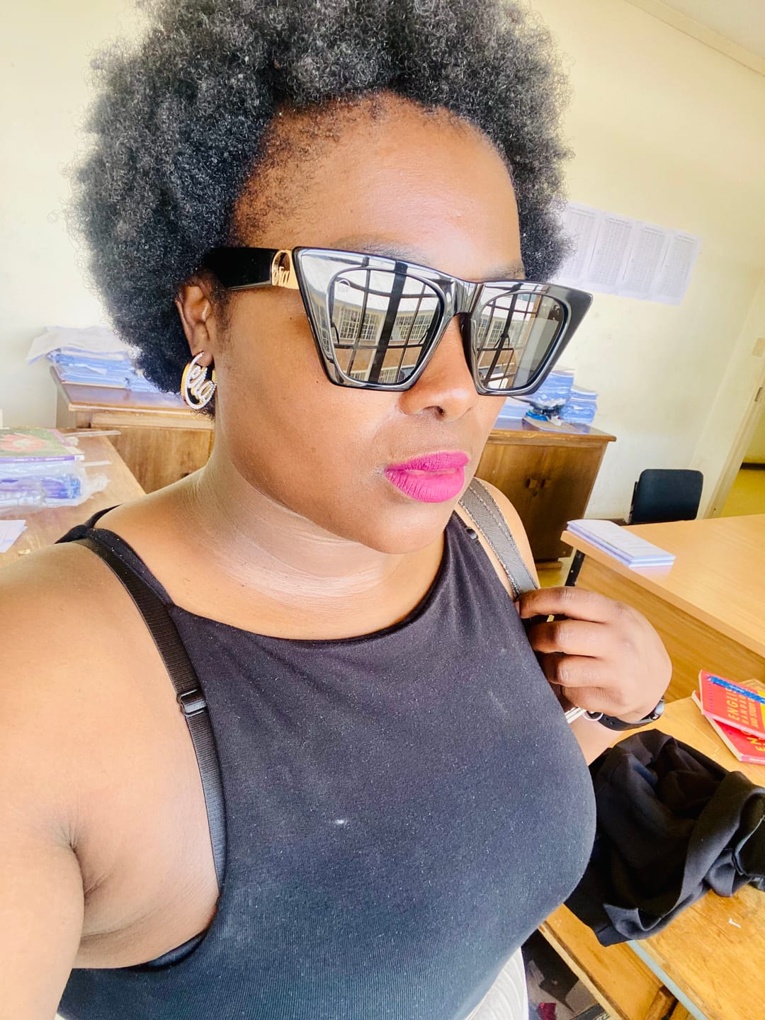 Customer photo review of Gold Luxe Mini Logo Hoops