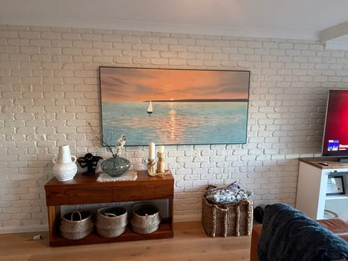 Customer photo review of The Empty Ocean-Serene Sunset Seascape Oil Painting with Sailboat, Nautical Art for Home Decoration