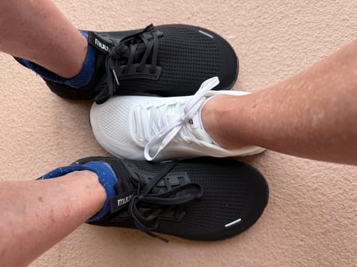 Customers showing their new black and white MUUV Stride Pickleball Shoes from a top-down perspective.