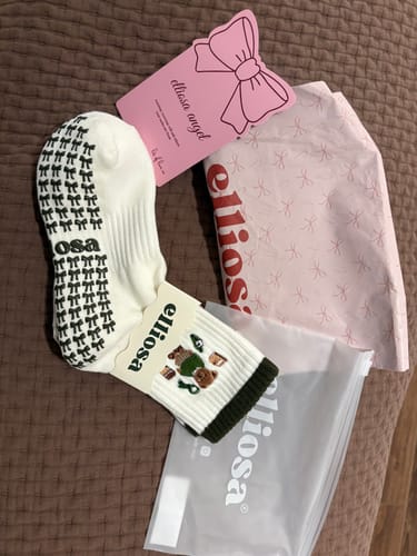 Customer's cute Beary Matcha socks laid out with packaging, showing the bear patch and bow-shaped grips.
