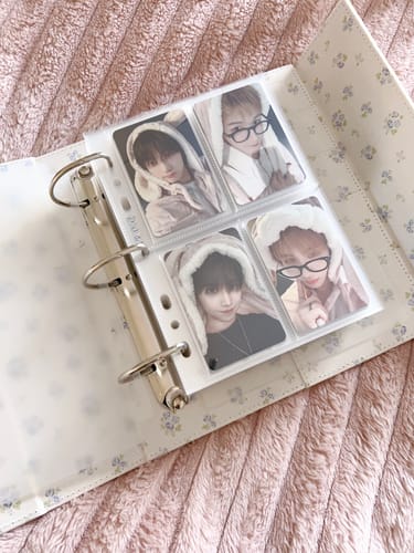 Customer's open LA VIE EN ROSE BINDER with floral print, showing A5 pages filled with photo cards.