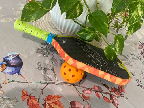 Customer photo review of Abstract Orange Edge Tape (3 pack) - Pickleball Paddle Edge Tape