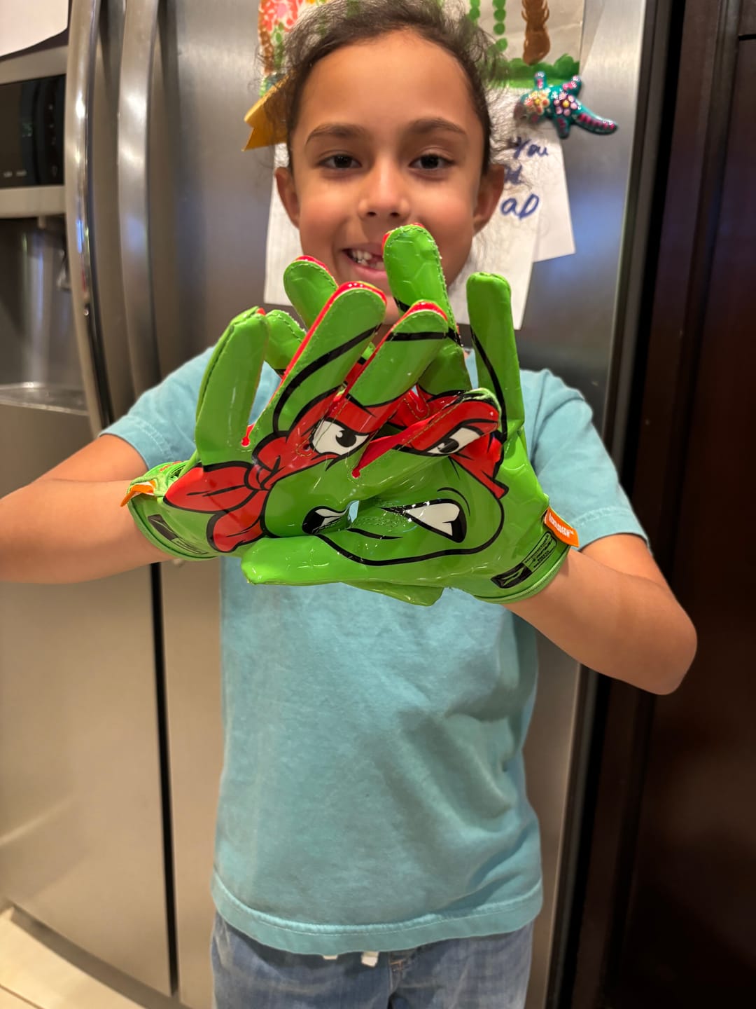 Customer photo review of Ninja Turtles: Raphael Football Gloves – VPS5 by Phenom Elite