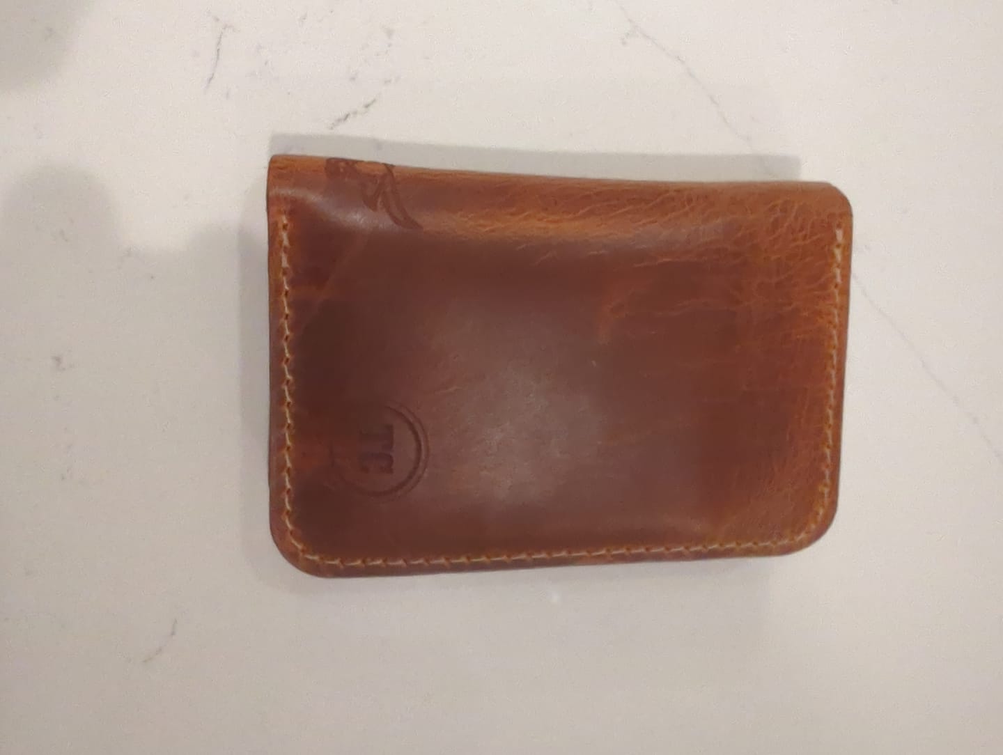 Customer photo review of The Tyler Vertical Wallet
