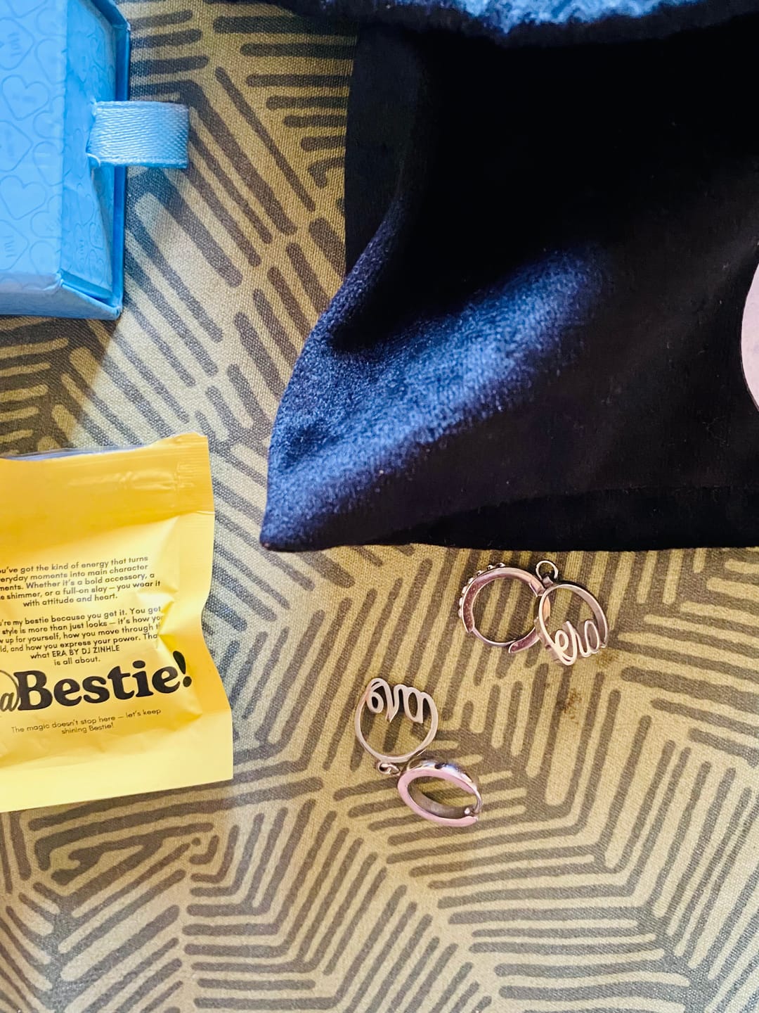Customer photo review of Silver Precious Logo Earrings