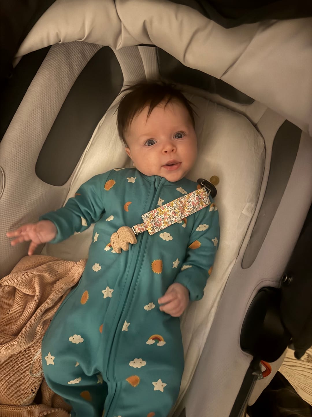 Customer photo review of Cream Rainbow Zip Organic Babygrow