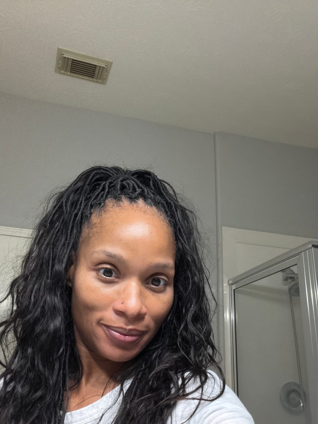 Customer photo review of Pre-looped Crochet Boho Locs with Body Wave Virgin Human Hair Curls