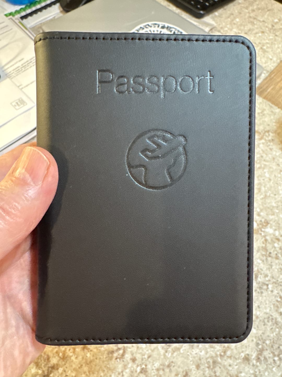 Customer photo review of Trackable Passport Cover