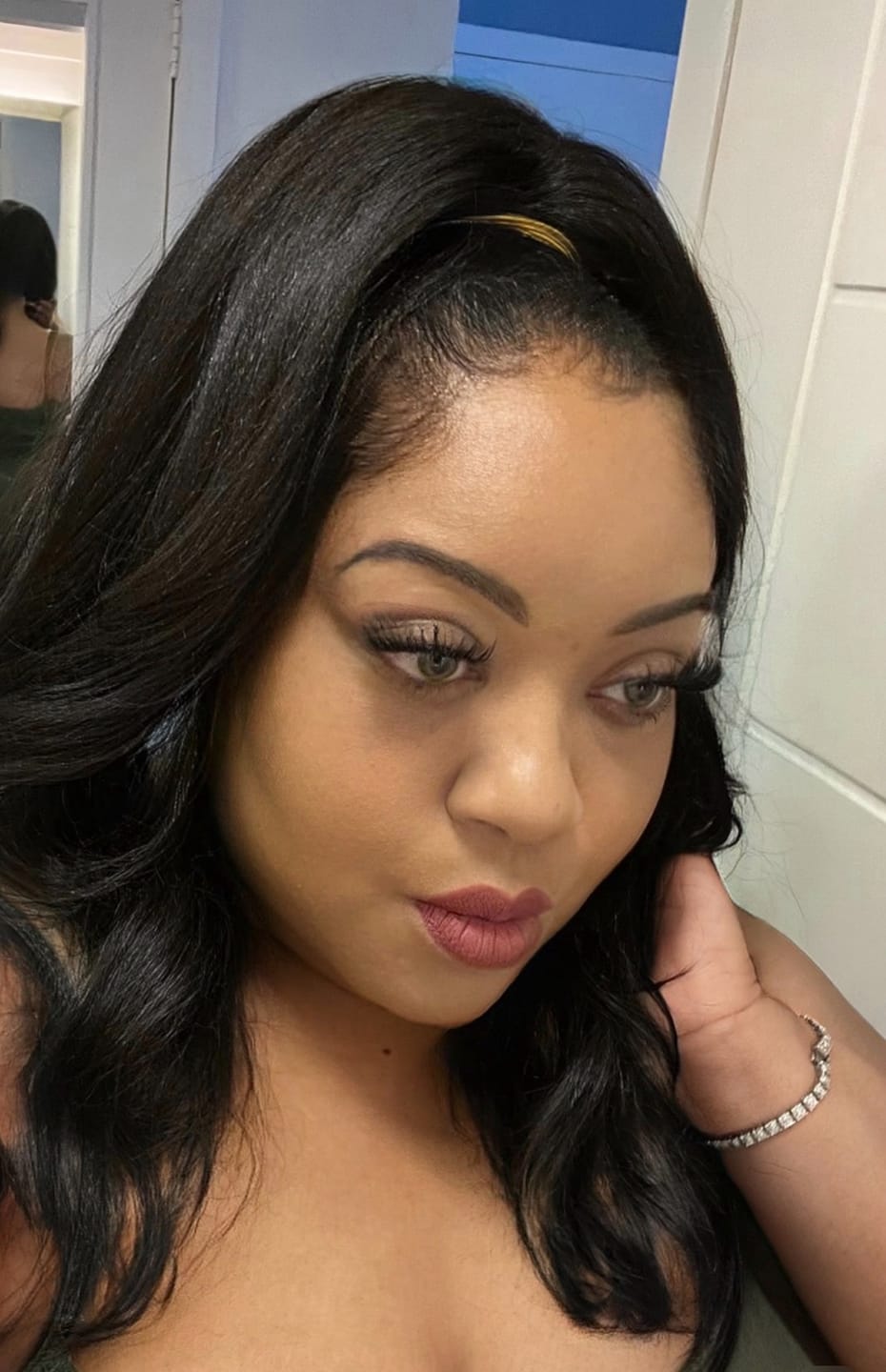 Customer photo review of Freetress Equal Drawstring Ponytail FEATHER GIRL
