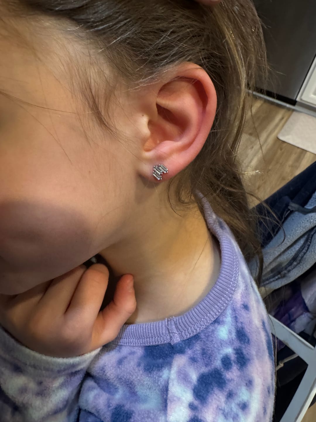 Customer photo review of Jovie 18k White Gold Plated 3-Stone Stud Earrings with Swarovski Crystals