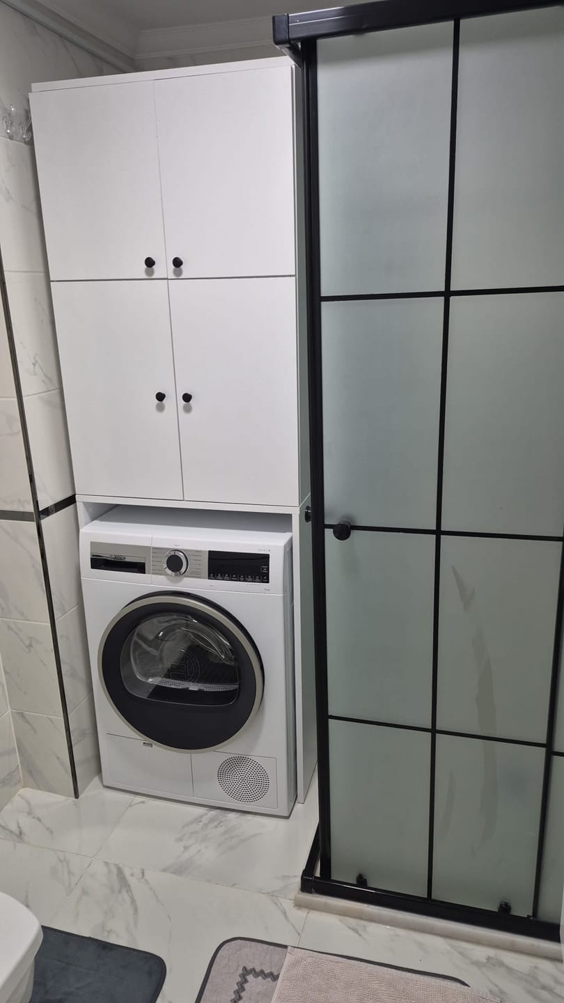Customer photo review of Rani KD114 Çamaşır Makinesi Dolabı 4 Kapaklı 5 Raflı Banyo Dolabı Beyaz