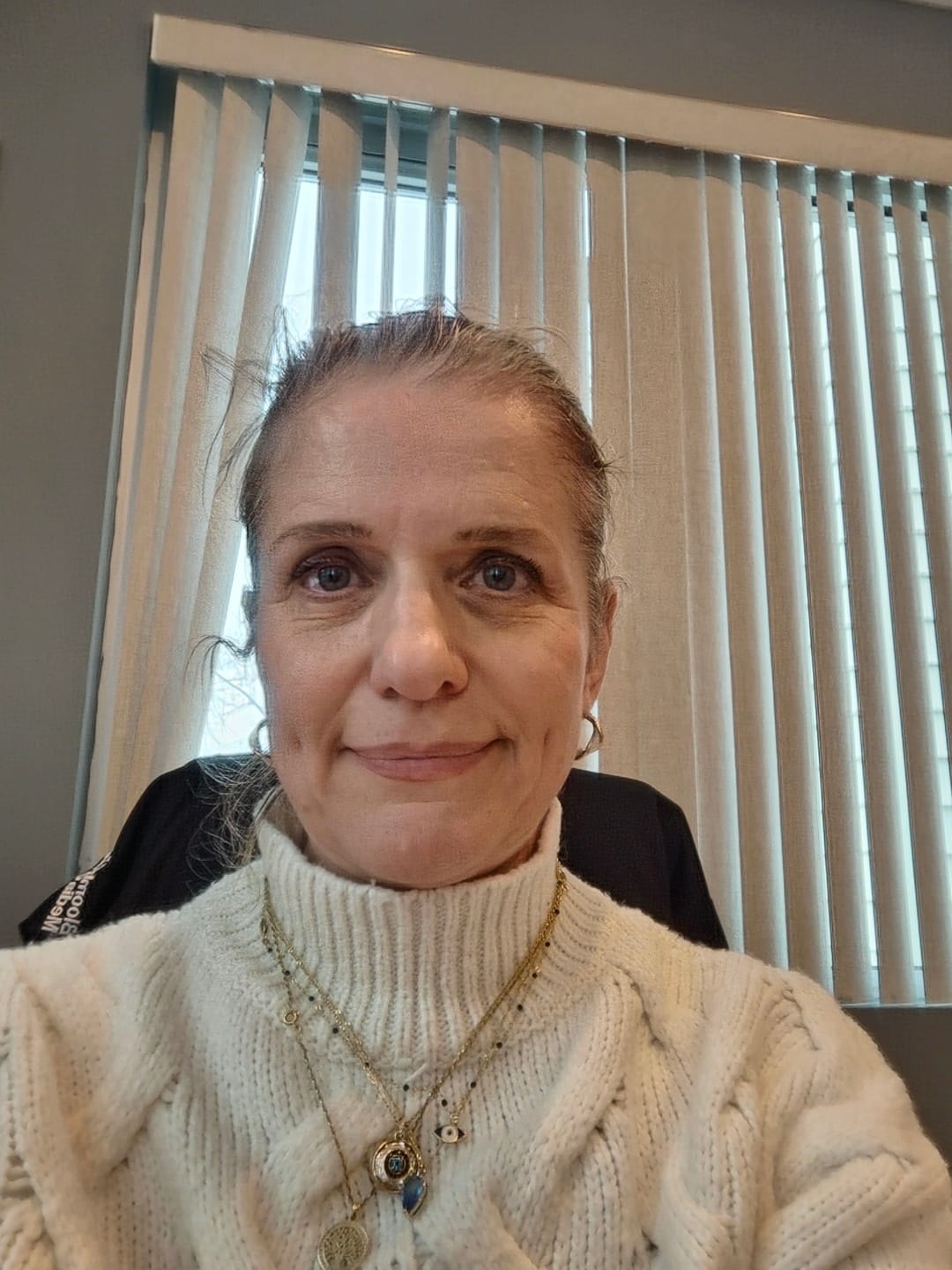 Customer photo review of Mother of Pearl Twist Hoop Earrings