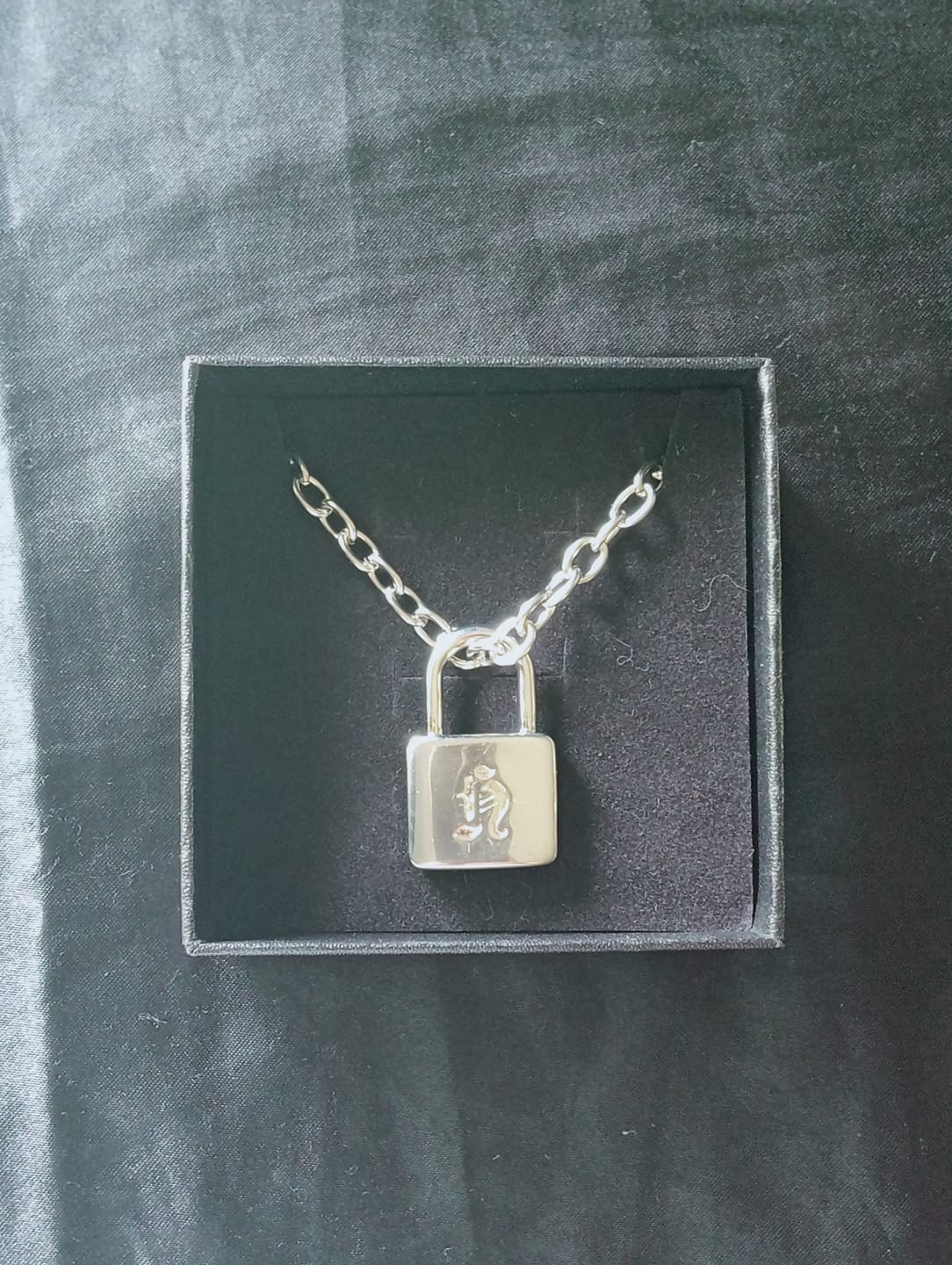 Customer photo review of SKZ World Tour Dominate: celebrATE Hyunjin Necklace