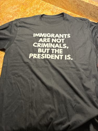 Customer photo review of Immigrants Premium Unisex T-Shirt