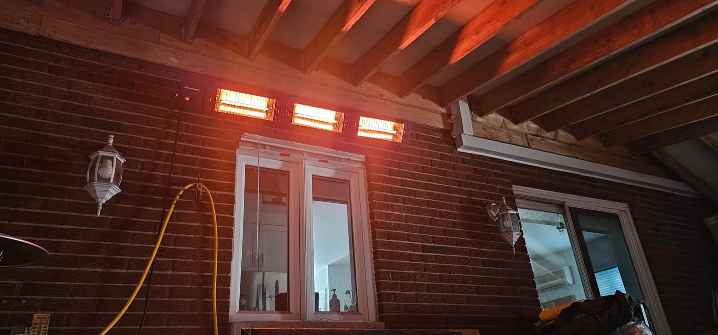 Customer photo review of Electric Infrared Outdoor Patio Heater, 4500W Wall Mounted & 24 Hours Timer