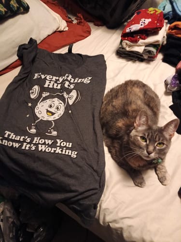 Customer photo review of Everything Hurts T-Shirt
