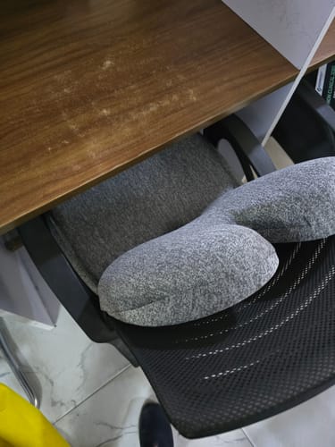 Customer's grey Frido Ultimate Pro Seating Combo placed on a black office chair.