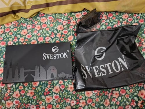 Customer showing the Sveston box and delivery bag for their Diesel Silver Blue watch.