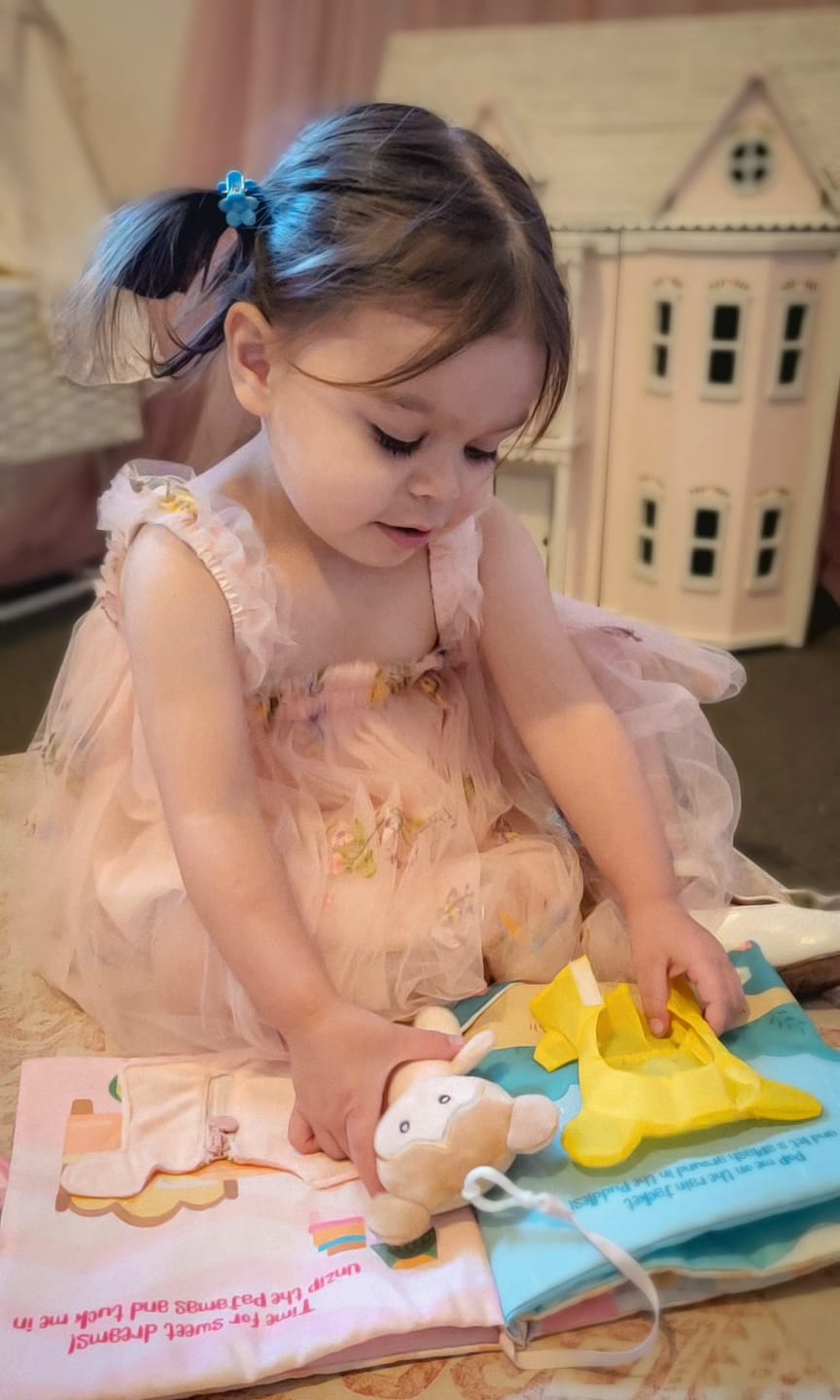 Customer photo review of Dress Me Right - Personalized Montessori Soft Book