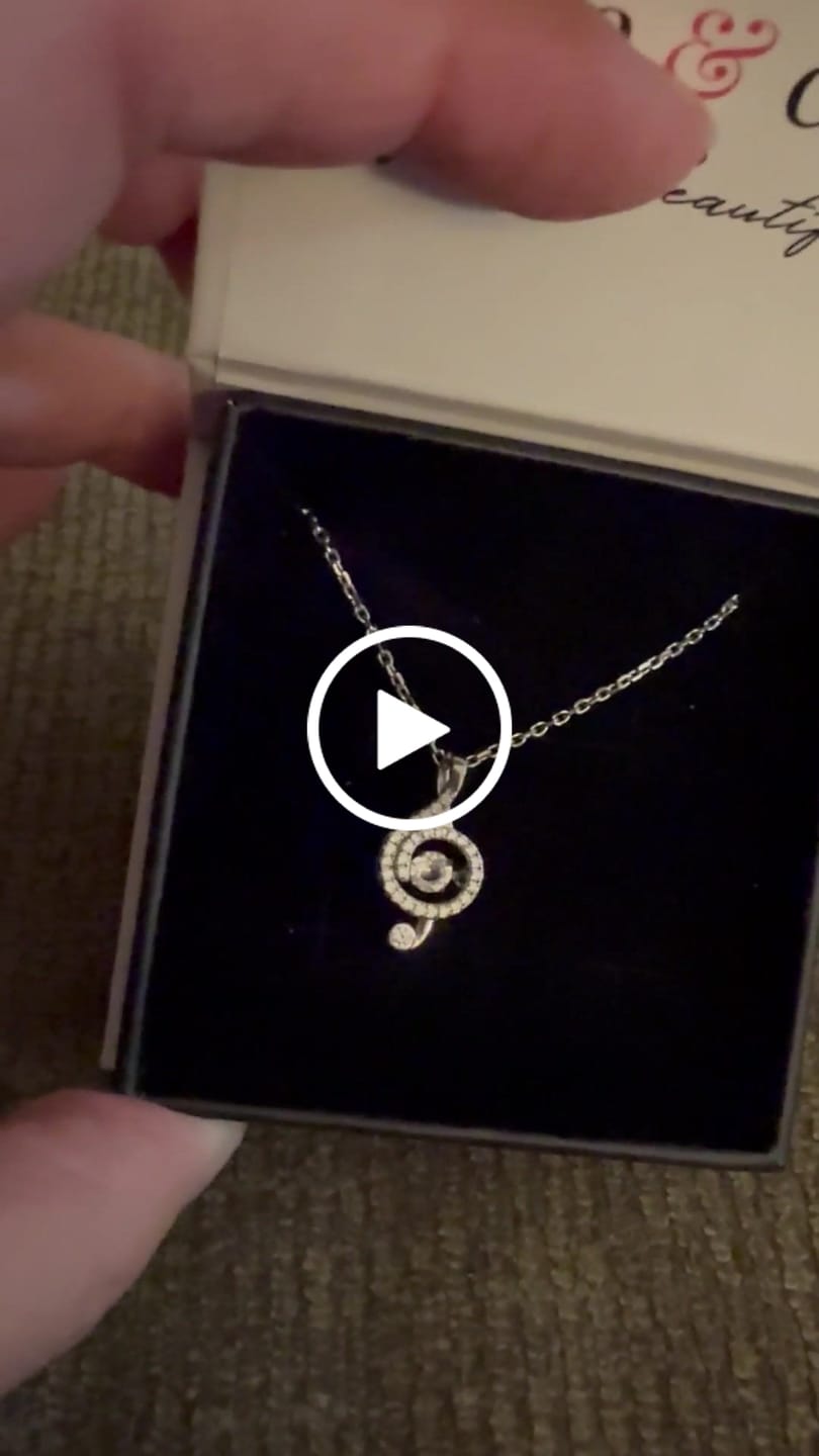 Customer video review of Jolene 18k White Gold Plated G-Clef Dancing Pendant Necklace with Swarovski Crystals