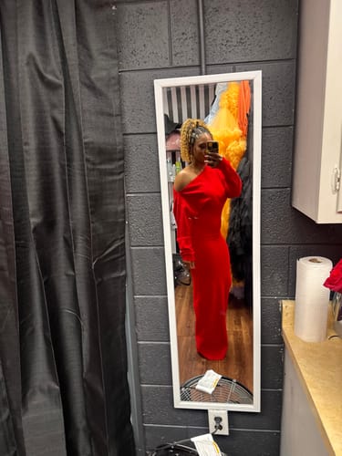 Reviewer showing the fit of the red Knit Off-Shoulder Sweater Maxi Dress in a full-length mirror.