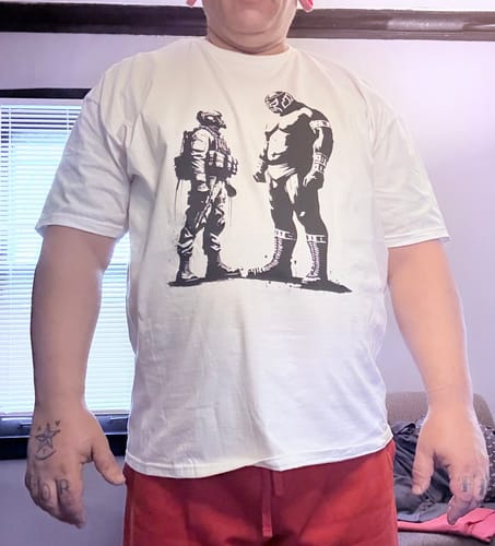 Customer wearing the white Luchador Vs. Everybody t-shirt, showing the good fit and graphic.