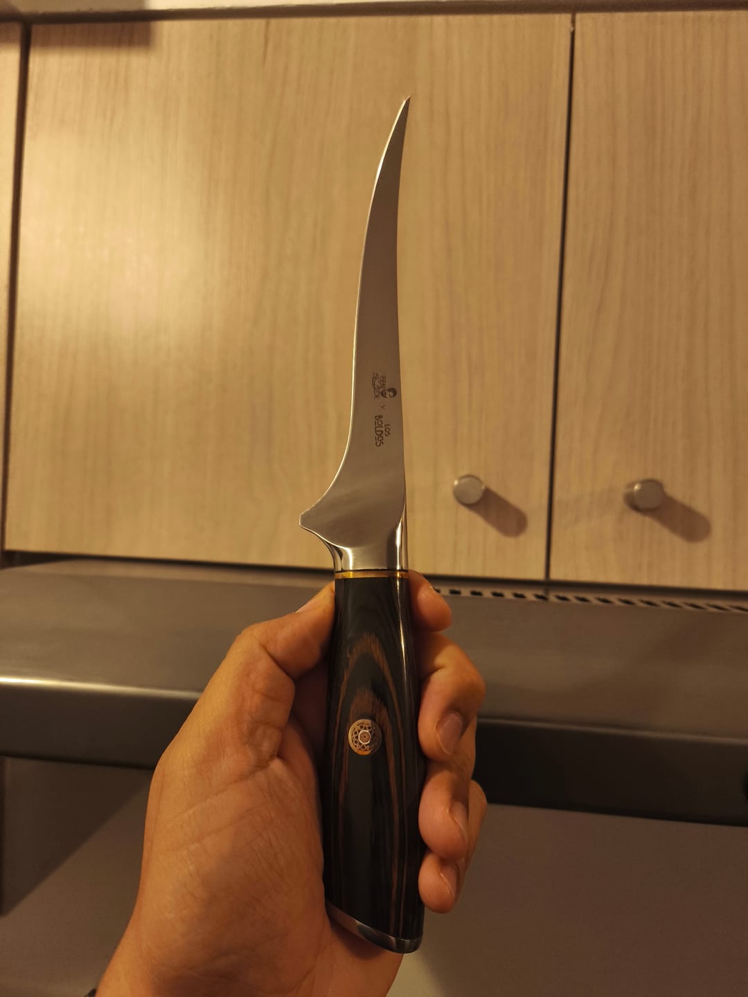 Customer photo review of Cuchillo Fileteador Japonés de Acero Alemán con Mango de Pakka