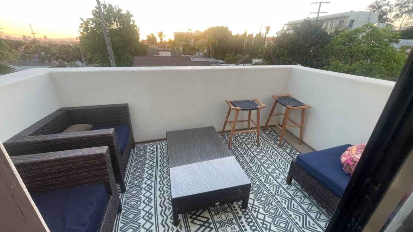 Customer photo review of Boho Plastic Straw Outdoor Rug - Gray