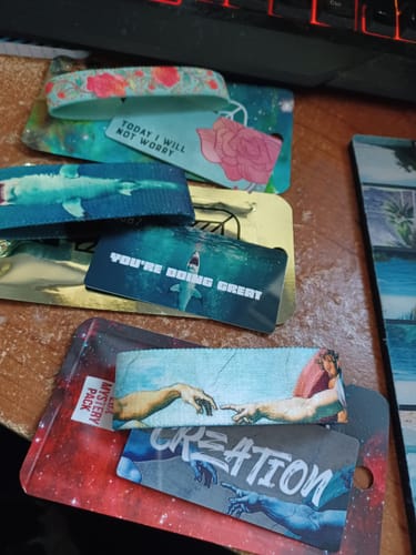 Customer's Non-Interactive Mystery 3-Pack showing the 'Creation', shark, and floral 'Today I Will Not Worry' bracelets.