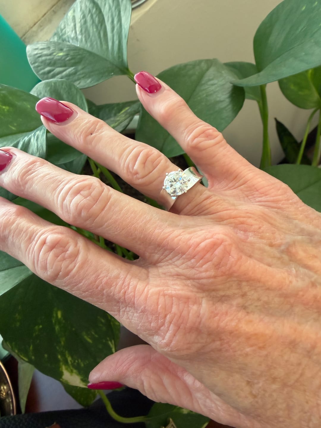 Customer photo review of Solitaire Round Moissanite Concave Wide Band Engagement Ring