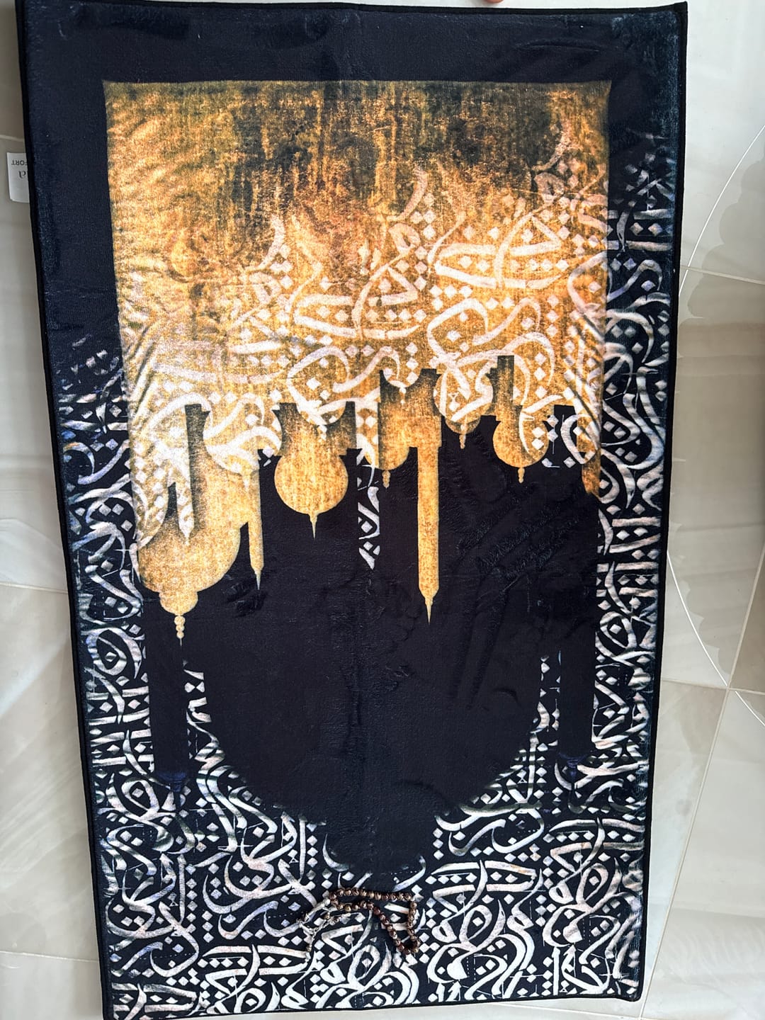 Customer photo review of Dark Arabic Calligraphy  Padded Prayer Mat