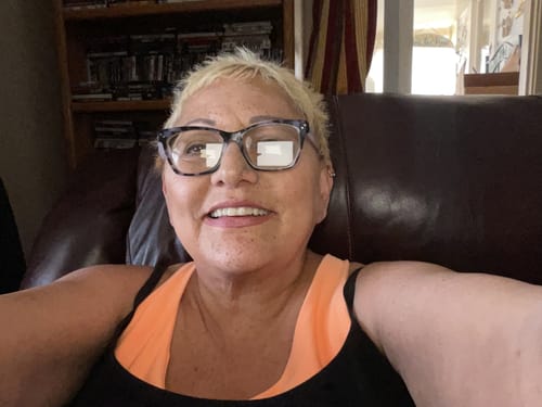 Reviewer smiling in a selfie showing her skin after using the Seranova Micro Infusion System.