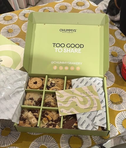 Customer's open Mixed Box of Postal Blondies, showing a variety of blondies in their green presentation box.