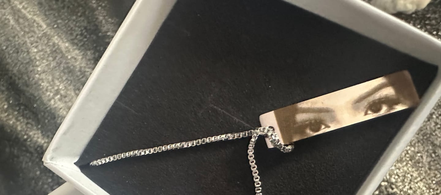 Customer photo review of Personalized Eye Photo Necklace