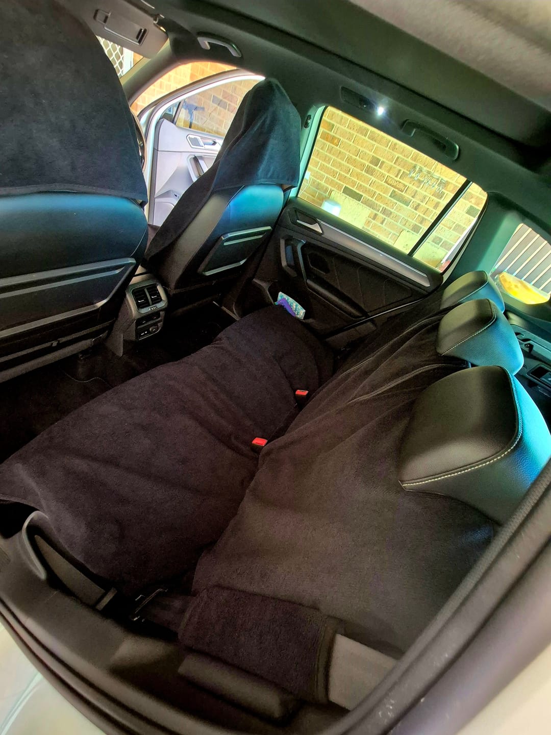 Customer photo review of Waterproof Seatbelt Protector 2 Pack – Black | Towel Society