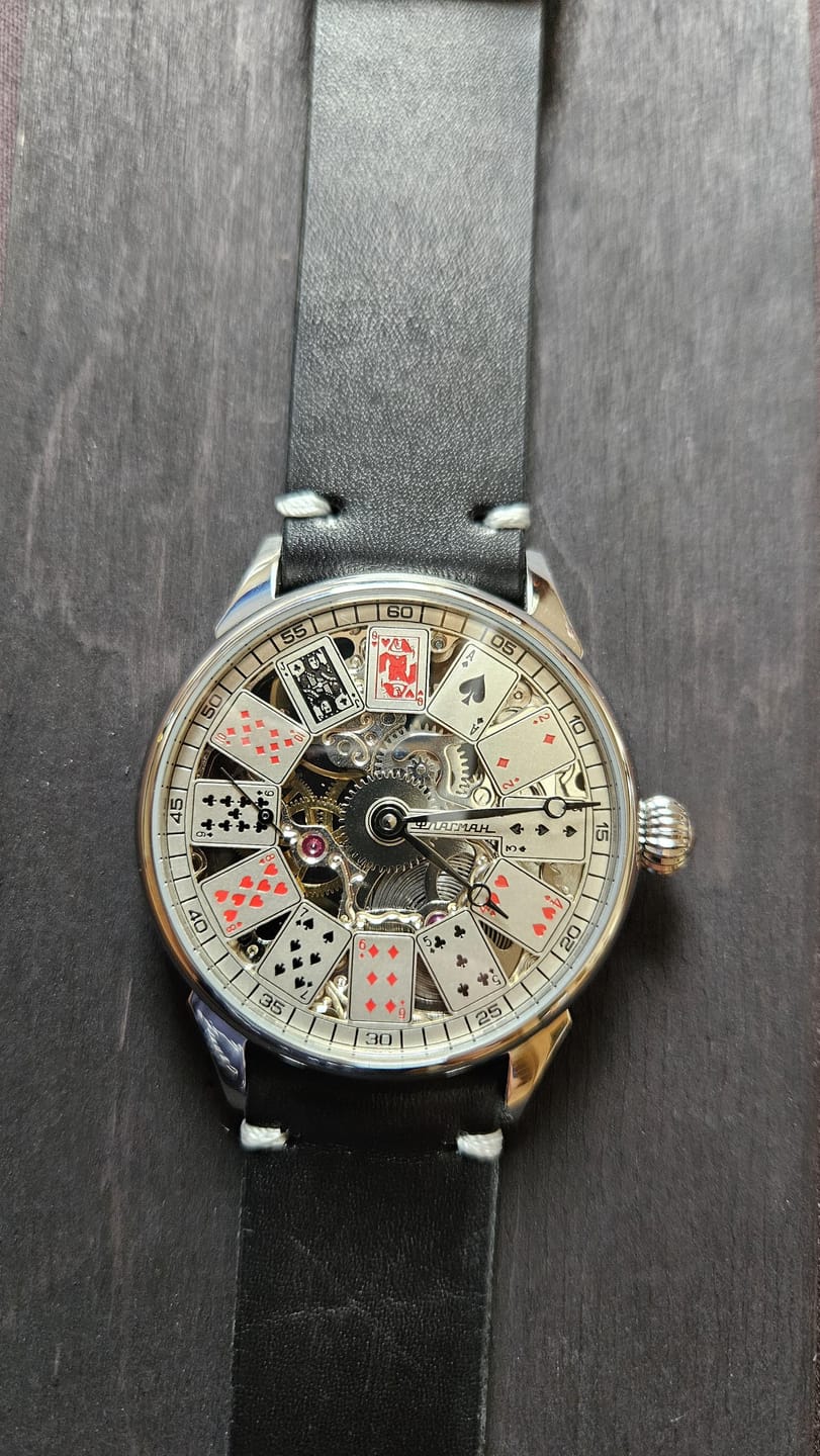Customer photo review of Skeleton Gambling Watch - Card table 1.0