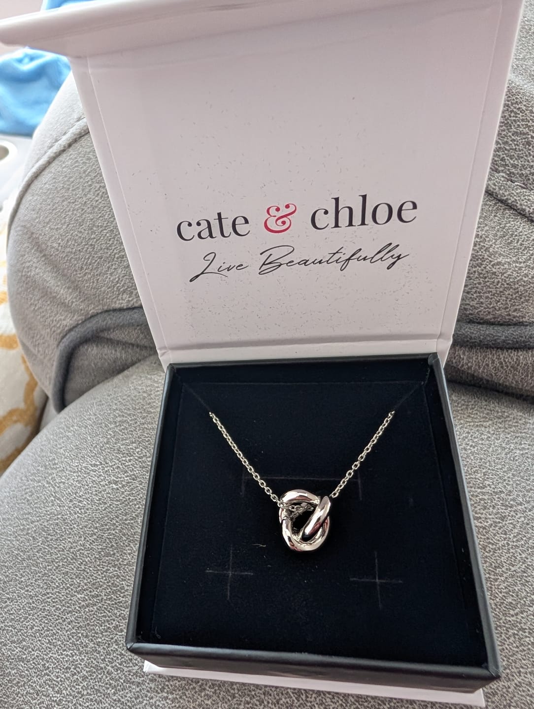 Customer photo review of Ashley 18k White Gold Plated Knot Pendant Necklace